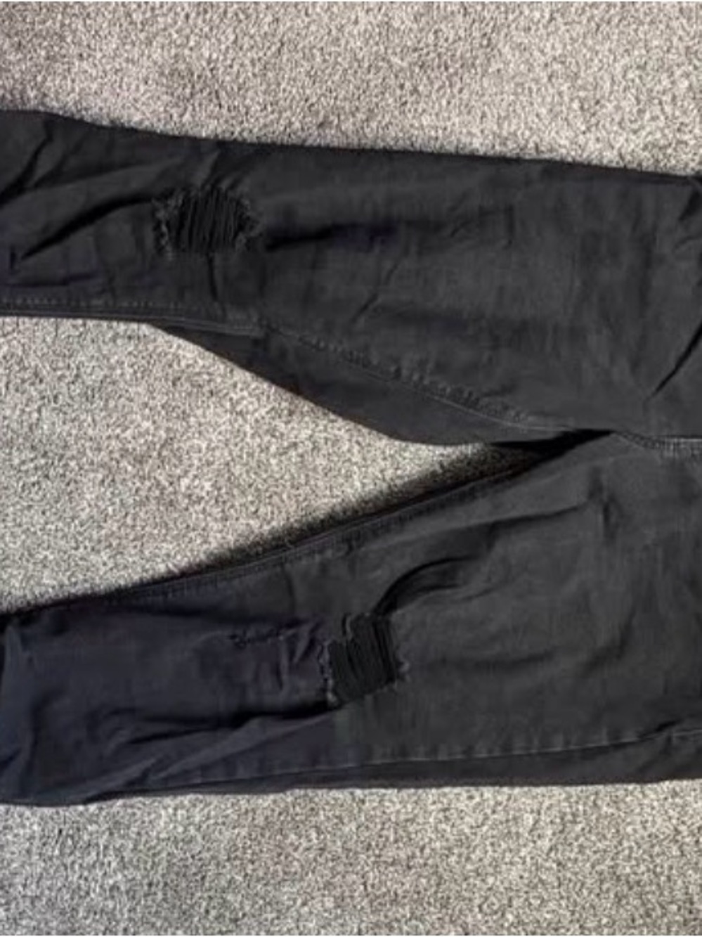 Black jeans with holes